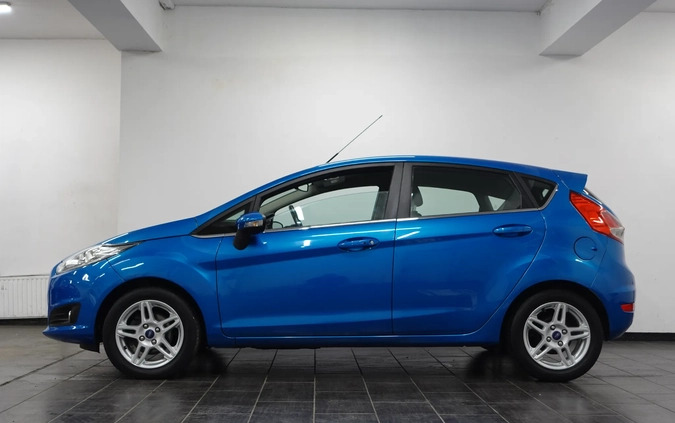 Ford Fiesta cena 26900 przebieg: 166556, rok produkcji 2013 z Wołów małe 781